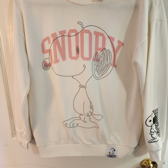 Peanuts Tops - Snoopy Graphic Sweatshirt in White and Pink. NWOT Excellent Condition.